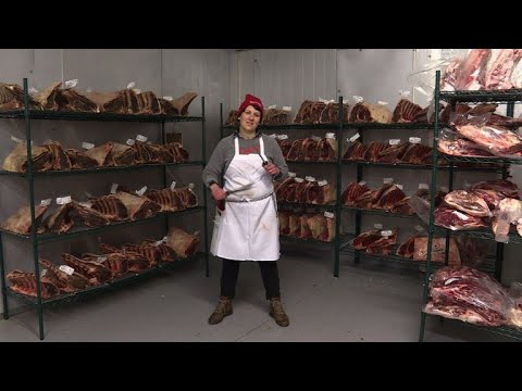 International Women's Day: Portrait of a female butcher