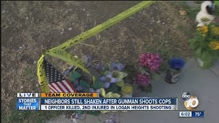 Neighbors still shaken after gunman shoots cops