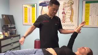 BLACK BELT Chiropactor giving a FULL Body adjustment using Applied Kinesiology Technique.