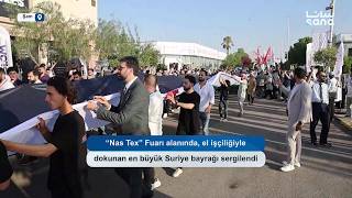 “Nas Tex” Fuarı alanında, el işçiliğiyle dokunan en büyük Suriye bayrağı sergilendi