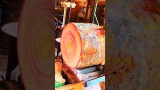 "Wood cutting method shaping log through mechanical precision motion"