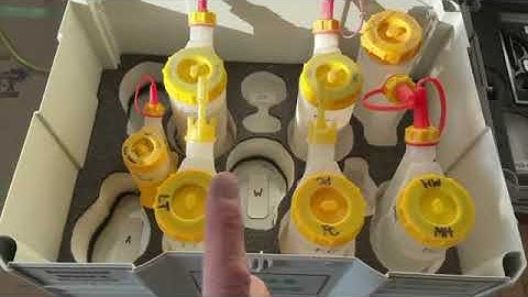 Roger using the GluBot Tip Lid