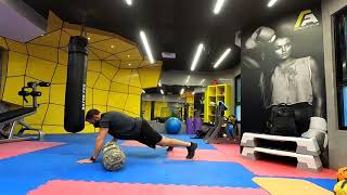 Exercise Library - Robot pushup to bag drag through
