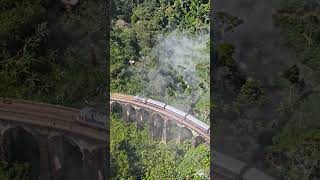 Train Crossing the Misty Nine Arch Bridge