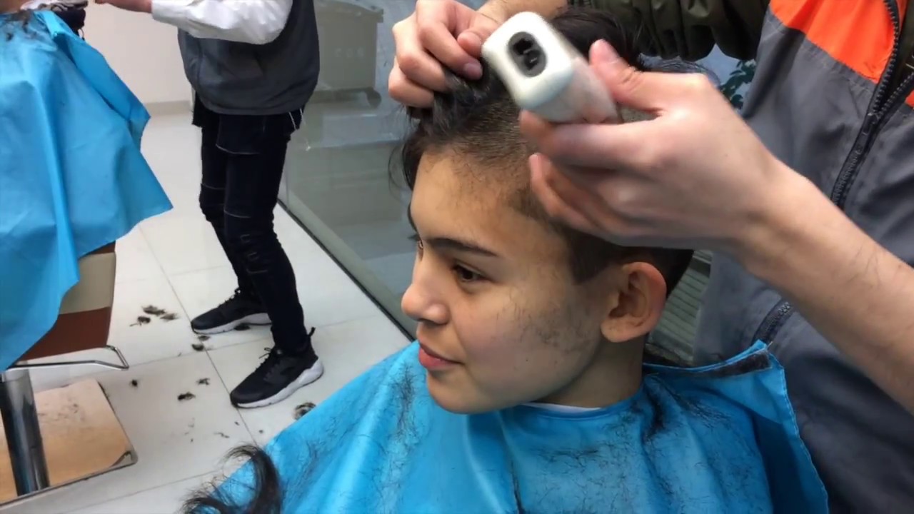 GIRL SHAVES HAIR (AGAIN)