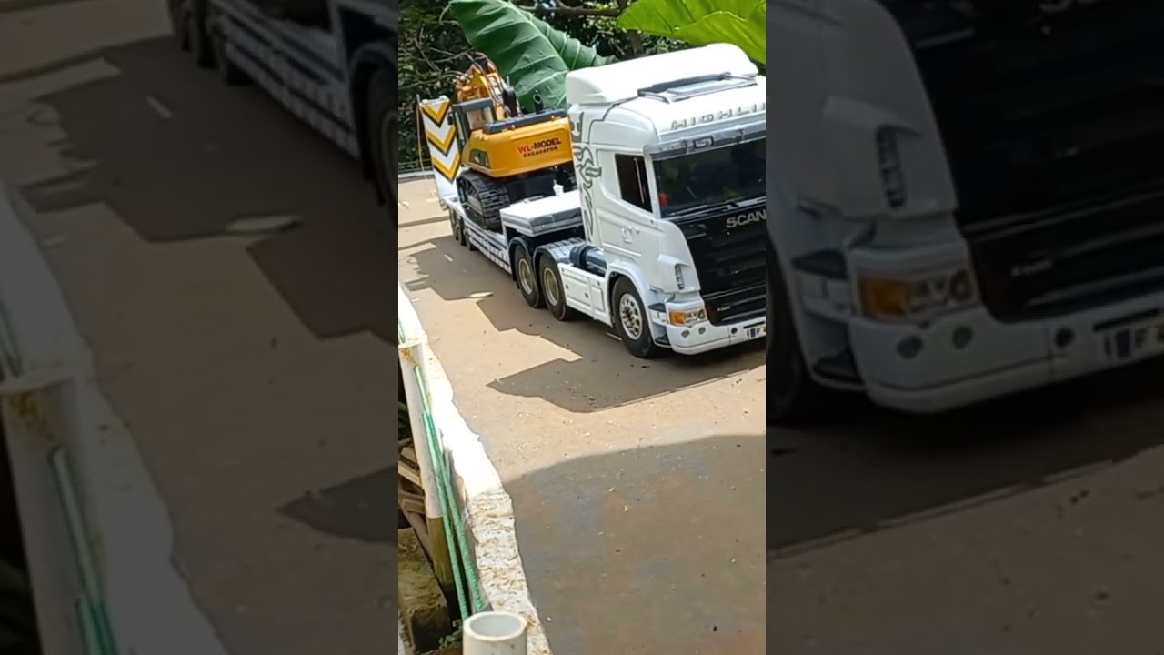 rc truck trailer loading excavator 