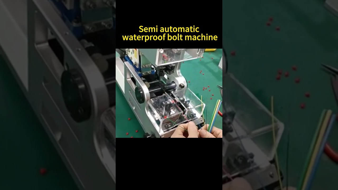 Semi-auto wire insertion machine for placing wires into connector housings.