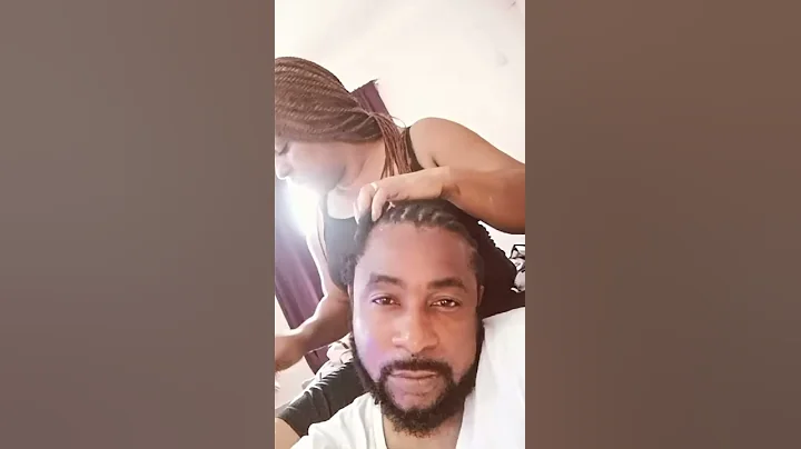 Pastor Mildred plaits Pastor Kingsley Okonkwo's hair