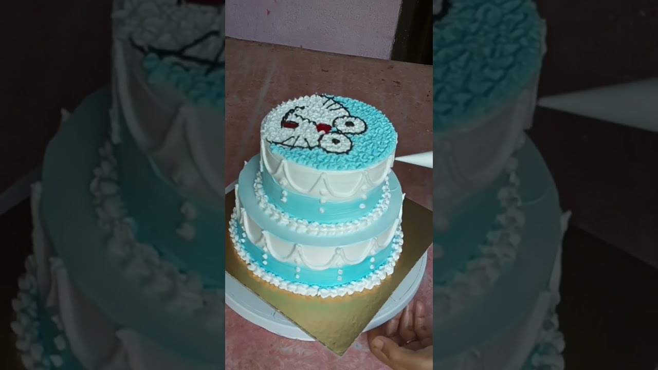 Making doraemon face 2 tier cake|Easy cake decorating tutorial in Bengali for beginners|