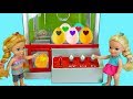 Elsa and Anna toddlers win Hatchimals from the claw machine