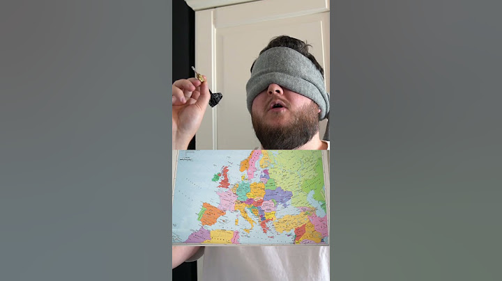 KASTER EN DARTPIL OG REJSER HEN HVOR DEN LANDER