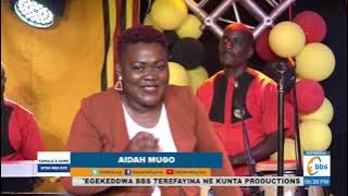 Aidah Mugo alangiridde omusajja, yanjooga nti omukazi wewaka tagenda out, wabula nakuwona