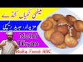 Meethi tikyan  koonday  tikkiyan ya puri excellent sweet snack      baba food