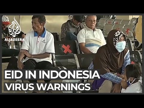 Thousands of Indonesians journey home, despite virus warnings