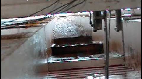 Dam break wave and air-water flow down a stepped cascade