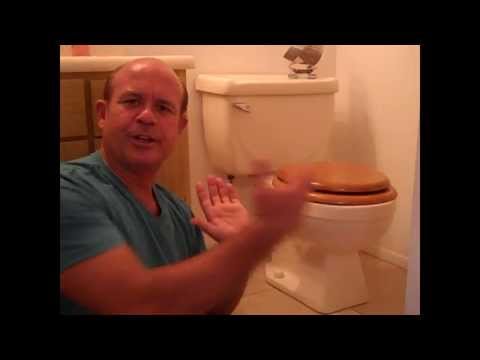 measuring-bathroom-cabinets-next-to-toilet