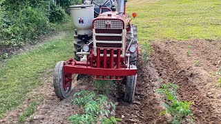 Tomato hilling setup farmall 140