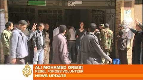 Rebel forces enlist to fight Gaddafi