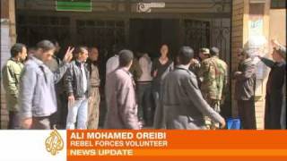 Rebel forces enlist to fight Gaddafi
