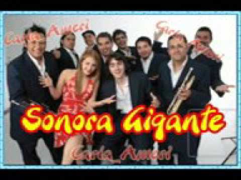 Watch the video for Por Tu Amor