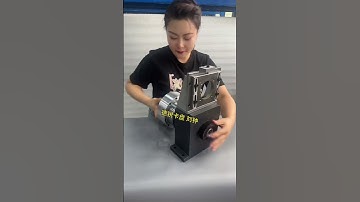 Rotary power chuck spindle holder for laser cutting machine.