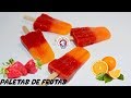 Paletas de fresas y naranjas