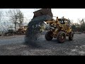 Moving containers and spreading gravel
