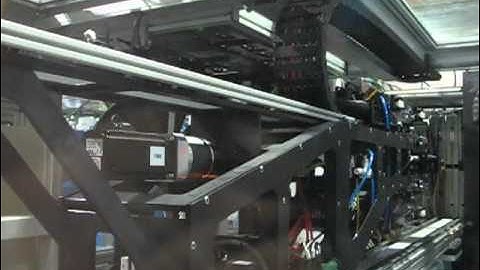 IMDECOL in mold labeling side entry standalone tow side label robotic system for plastic container