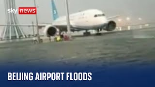 China: Beijing airport floods after Typhoon Doksuri hits capital