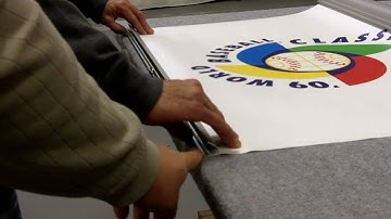 Mounting the top profile of an Expand retractable display to a graphic panel