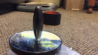 Bedini Motor with spinning magnet top - charging a 12 volt battery