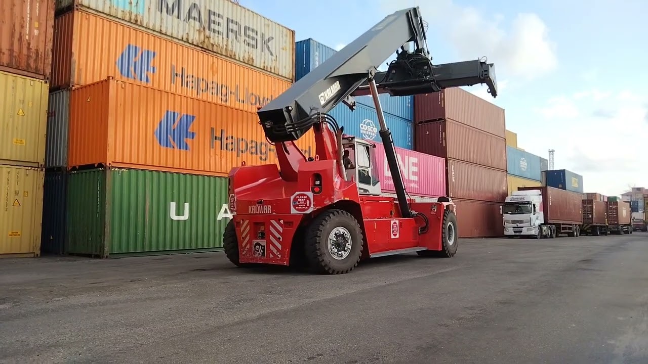 Kalmar Reach stacker with a tilting spreader for container handling