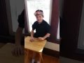 Little kid pen tapping like a boss