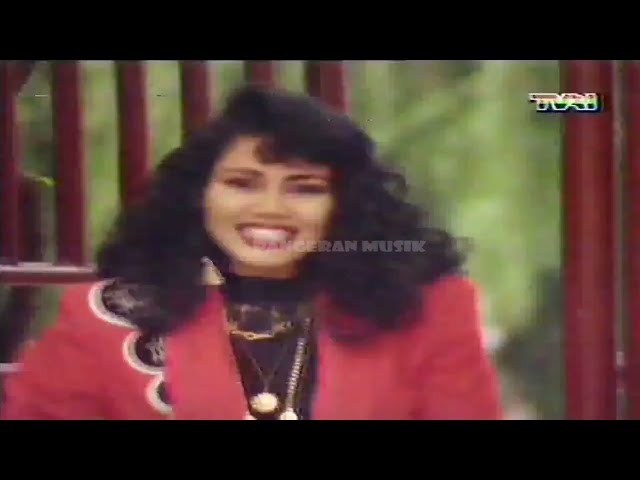 Rita Sugiarto - Masuk (1993) (Original Music Video) class=