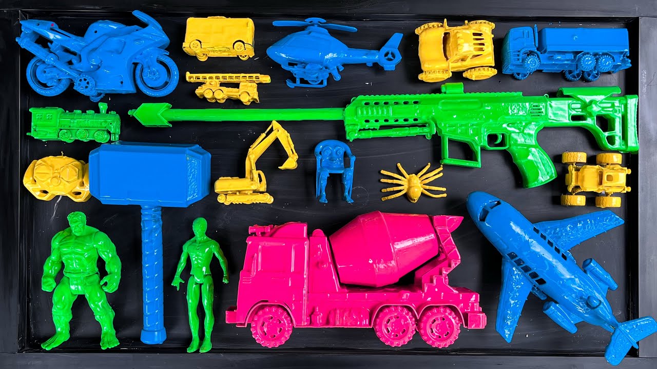 Membersihkan mainan mobil-mobilan ,truk tangki,pesawat terbang,kereta uap,superhero,anomali.