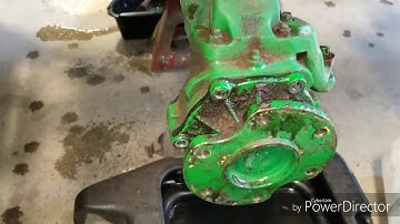 2005 John Deere 790 outer front gear replacement.