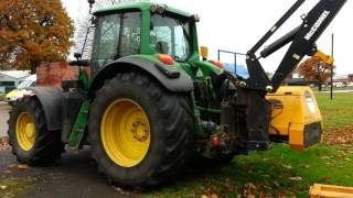 John Deere 7530 with McConnel power arm hedge cutter