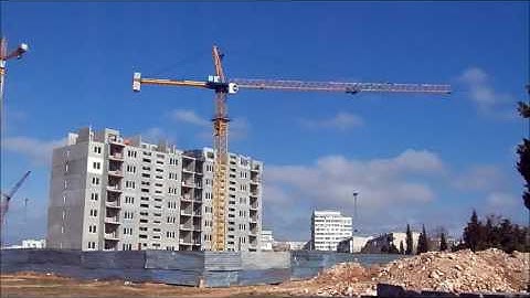 Строительство панельного дома башенным краном Peiner System