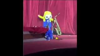 Stan Twitter: Kid In A Minion Costume Being Grabbed Behind Curtain