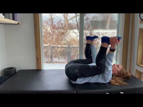 Happy baby posture that helps low back and pelvic floor tension