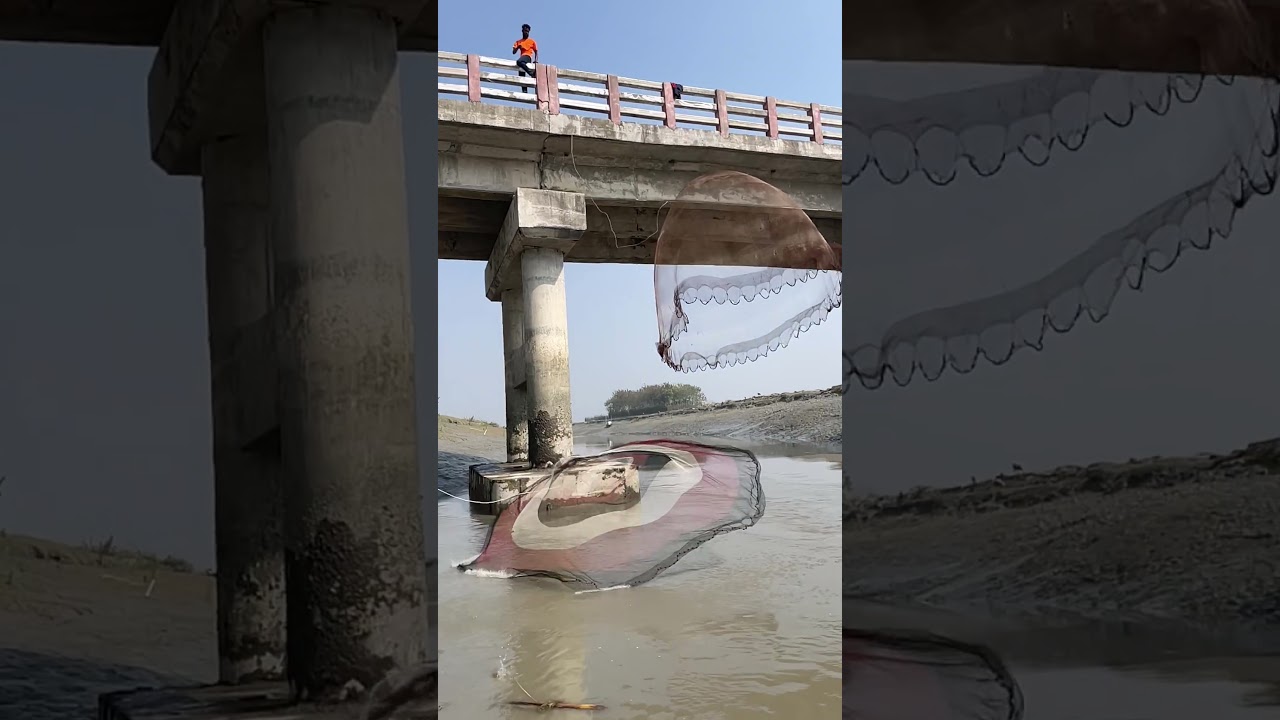 Catching fish with cast net from the bridge 