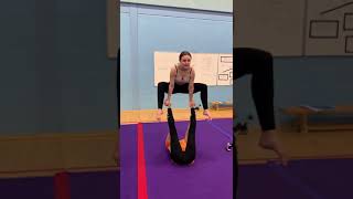 Straddle-hold on feet.