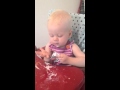 Adorable baby with sensory processing issues will not touch food.