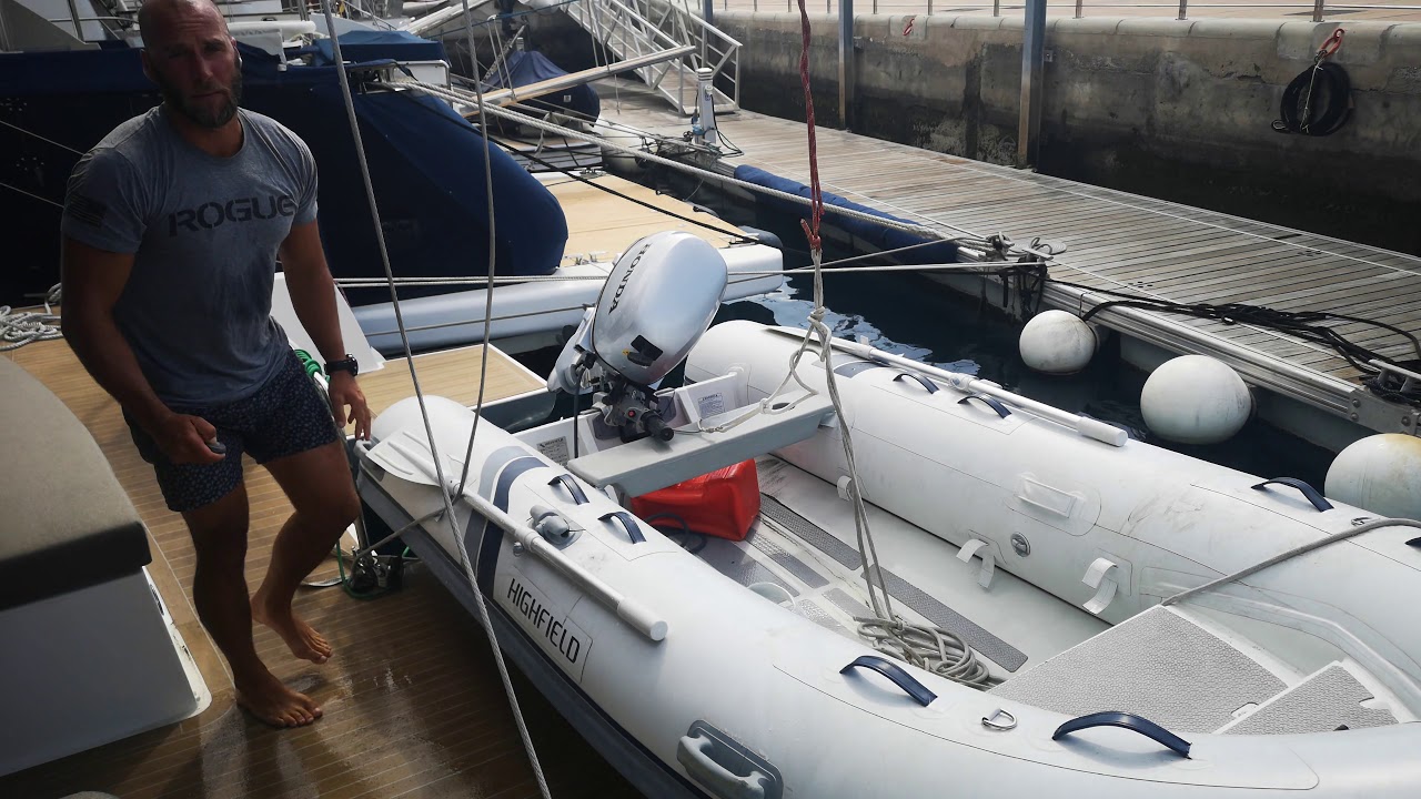 Raising the dingy in the Marina with no swell for a neel 51.
