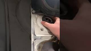 comparing old strut clamp to new
