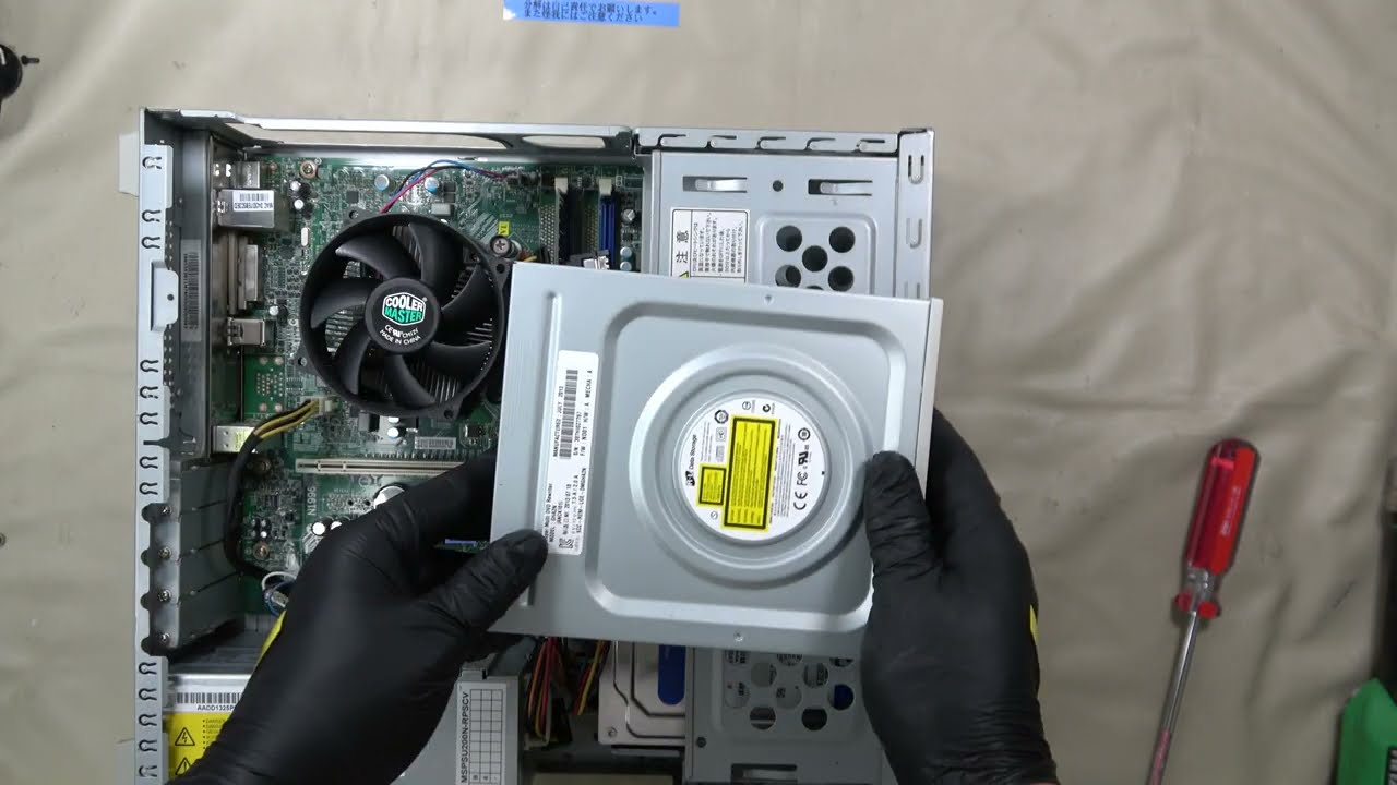 How to remove the optical drive on an NEC PC-VL150MSW. - YouTube