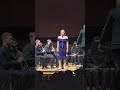 Kelly Flynn singing “Blue Moon” with the FGCU Symphonic Band
