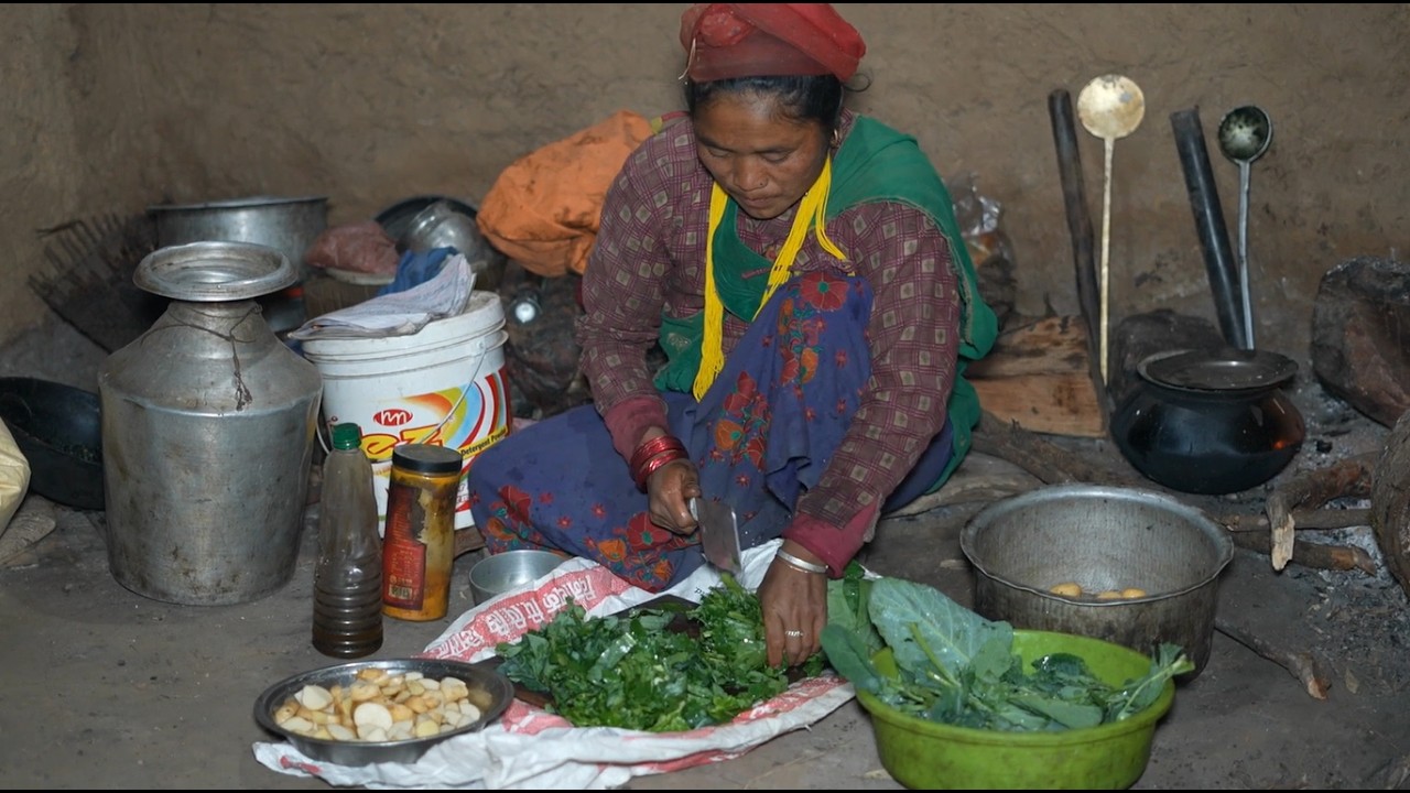 Cooking green leafy vegetables and potato curry in the village ll Rural ...