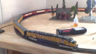 HO Union Pacific layout test new tunnel and reversing section. We did a hole in the wall!