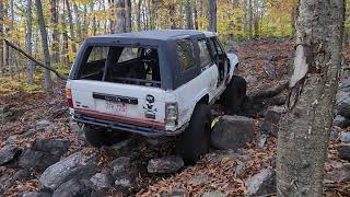 Toyota 4runner battling up the loose rocks